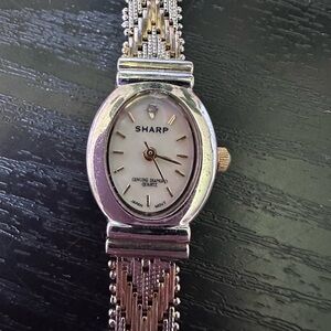 Vintage SHARP Mother of Pearl Fave Genuine Diamond Quartz